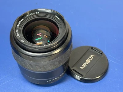 Objectif Minolta AF Zoom Xi 28-80 mm f/4-5,6 avec bouchon filtre 55 mm fabriq... - Photo 1/4
