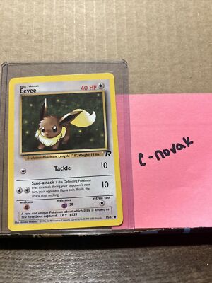 1995 eevee pokemon card value 55/82 Eevee Team Rocket 1st Edition 55/82 SGC 8.5 main image 1