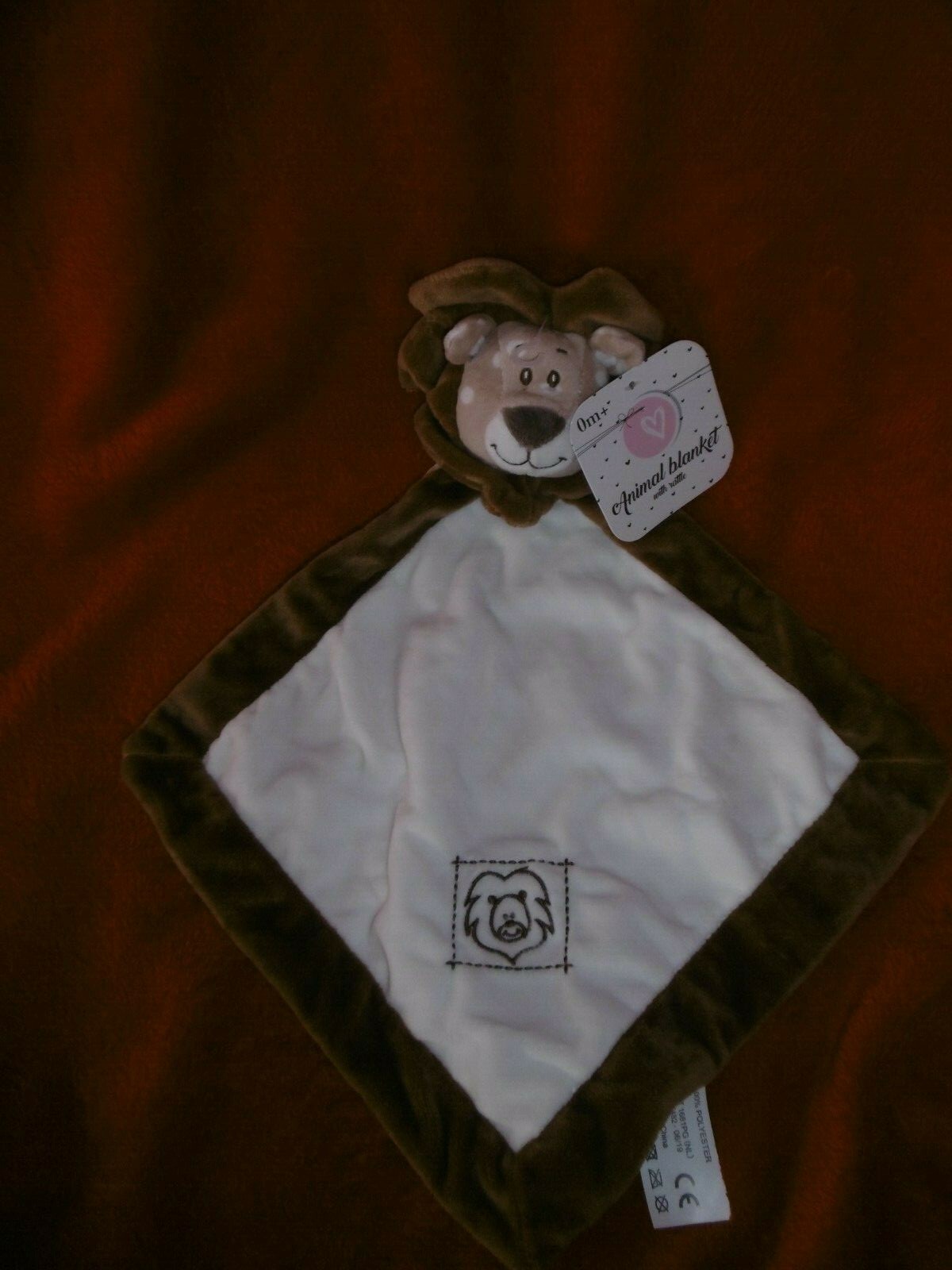 Doudou plat grelot lion beige couverture de sécurité pour apaiser bébé