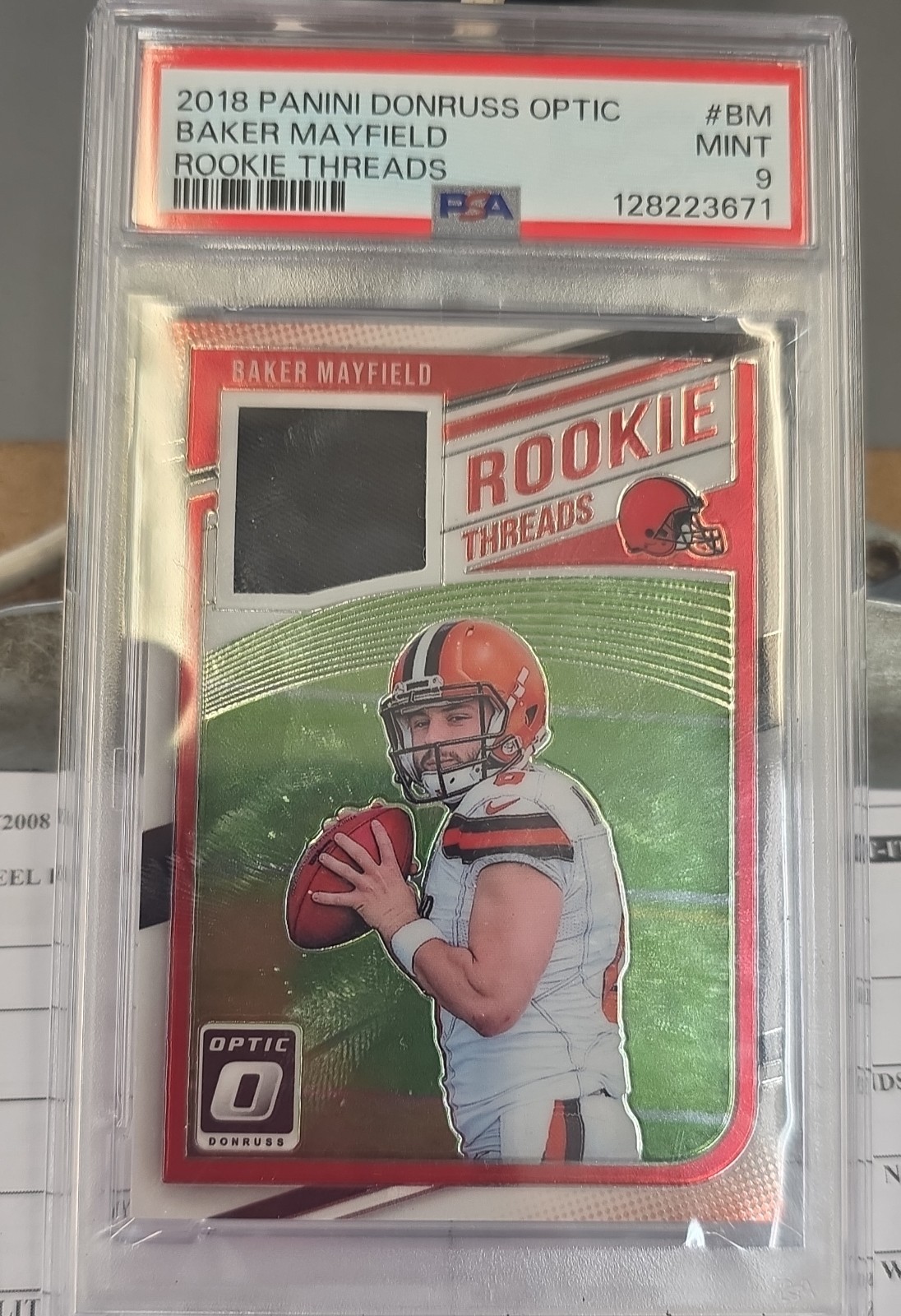 2018 Donruss Optic - Rookie Threads Baker Mayfield #RT-BM (MEM, RC)