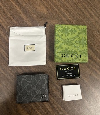 Gucci Grey GG Supreme Coin Wallet, featuring a bi-fold design