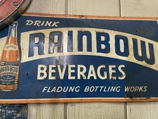 Vintage metal sign 1930s soda pop cola. drink rainbow beverages fladung bottling