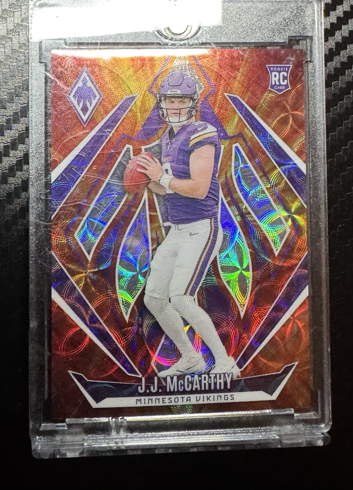 2024 Panini Phoenix - Rookies J.J. McCarthy #185 Fire Burst /350 (RC)