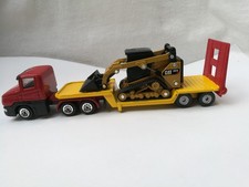 SIKU Transporter mit Ladung Caterpillar 297D