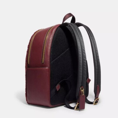 coach fluffy backpack Charter In Signature Shearling Club de Mode A luggage sleeve and top handle offer versatile carry options. COACH CY | Tabby Backpack
