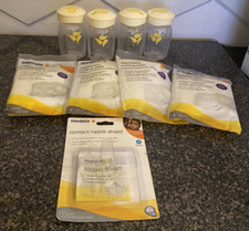 Lot of 4 Medela Breast Milk Bottles  Nursing Pads