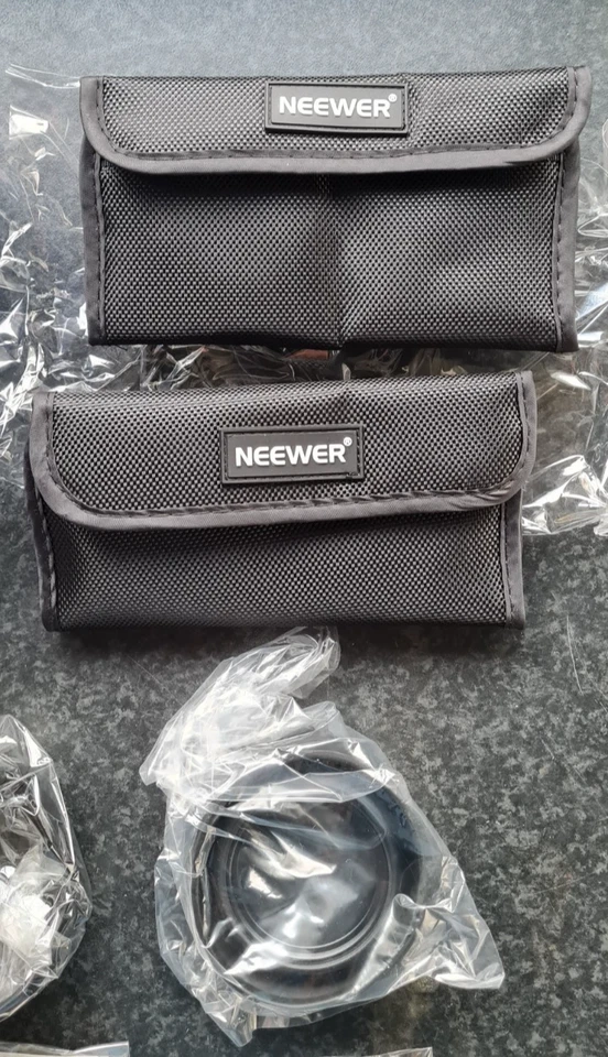 Neewer 49mm Objektivfilter Zubehörset ND + UV + CPL Filter + Gummi Gegenlichtblende + - Bild 2 von 4