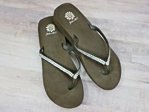 yellow box brown flip flops