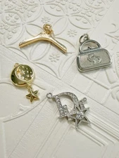 Lot of 4 Chanel buttons and zipper Pulls Charms