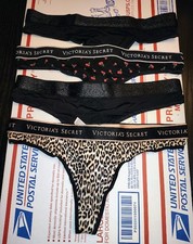 MEDIUM - VICTORIA'S SECRET LOGO BAND COTTON STRING THONGS LOT OF 4 - AS SEEN