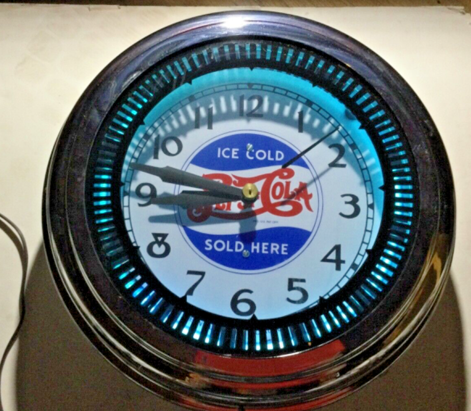 Vintage Pepsi Cola clock / sign neon clock sales chicago Ill. spinner