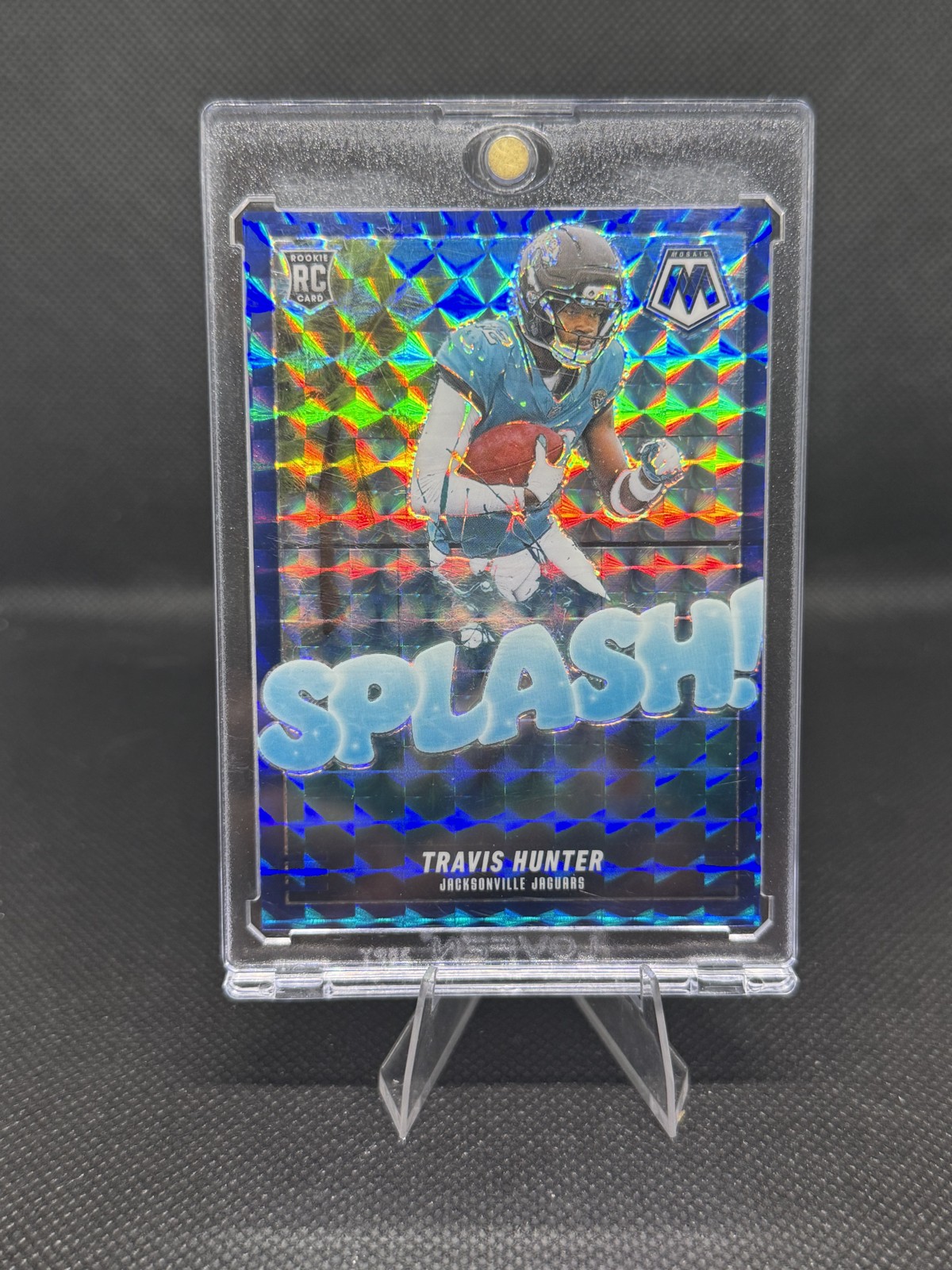 2025 Panini Mosaic - Splash Mosaic Travis Hunter #16 Blue Prizm /99 (RC)