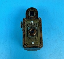 Coronet Midget fotocamera pellicola subminiatura 16 mm, bachelite marmorizzata marrone circa 1935