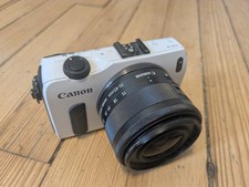 Canon EOS M, white, with 15-45mm kit lens, good condition, charger and battery