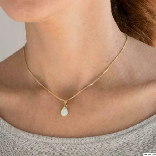 Colgante solitario de ópalo de fuego corte pera de 2 quilates 18" con cadena enchapado en oro amarillo de 14 quilates Foto 3 de 4