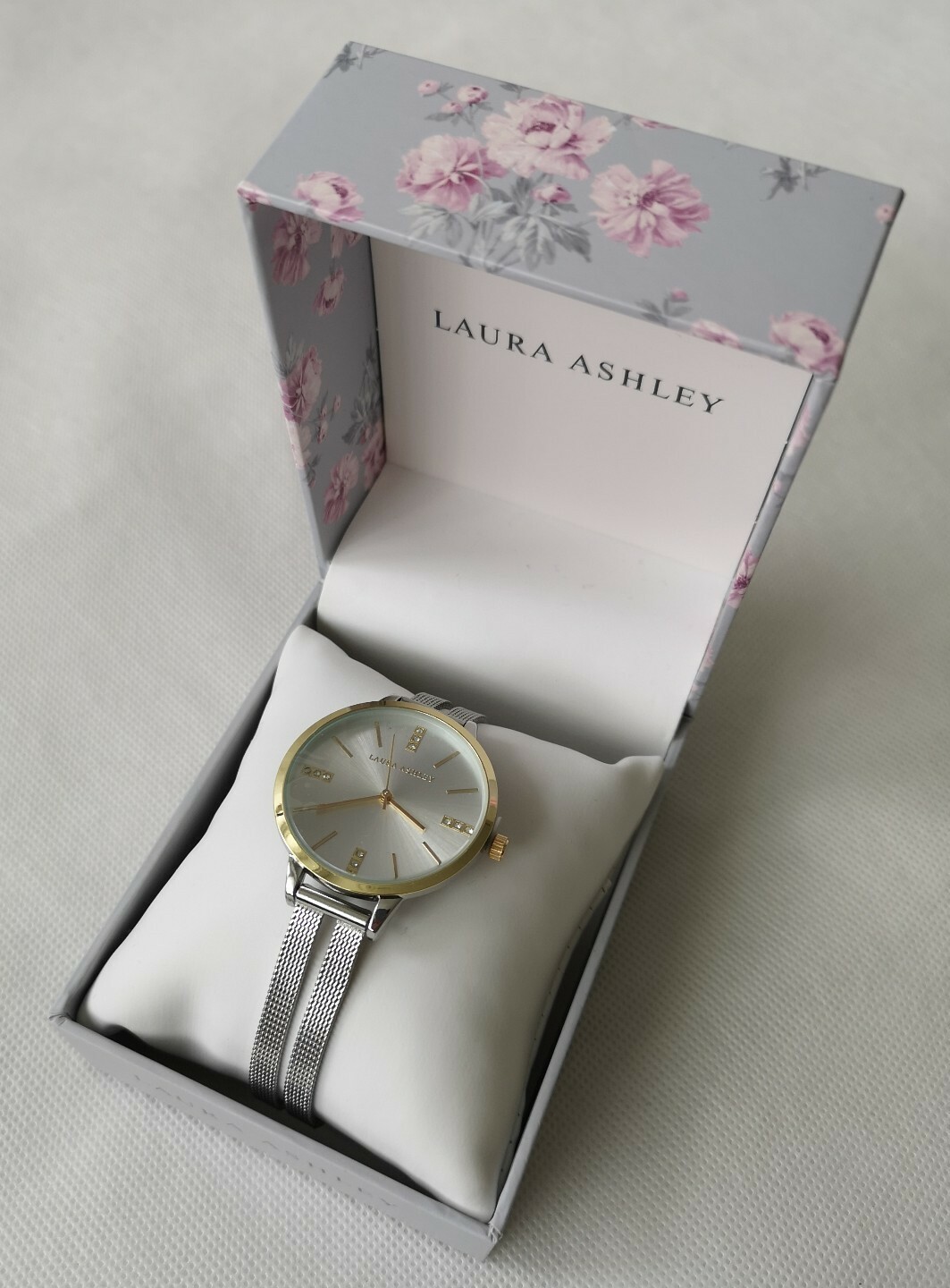 silver belt watch