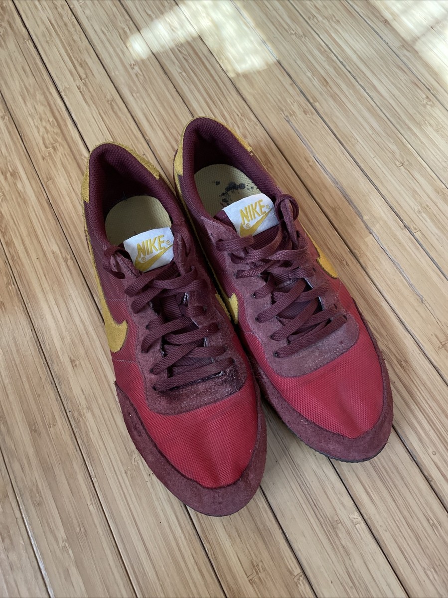 maroon and gold nike sneakers