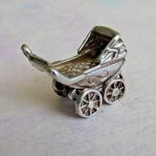 VINTAGE SILVER MOVING PRAM CHARM