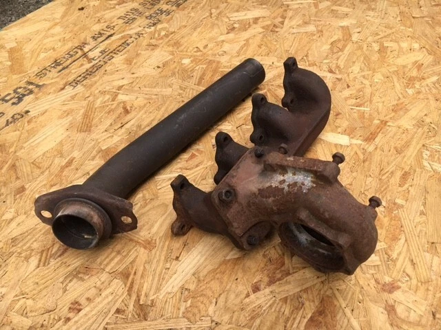 Colector de escape y carcasa turbo Mopar Vintage OEM 1985 Dodge Omni Turbo I Foto 2 de 4