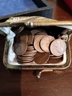 115 wheat cents in old change purse