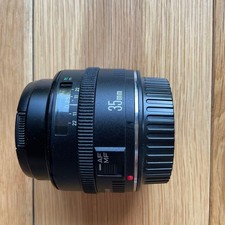 Canon EF 35 F/2 Lens, With Lens Hood And Instruction Manual.