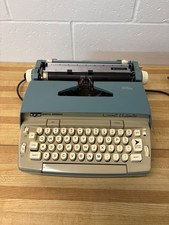 Workin 1970's Smith Corona Coronet Automatic Electric Typewriter w/carry case thumbnail