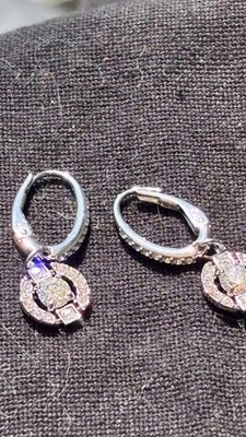 SWAROVSKI Una Pierced Drop Earrings with Dancing Crystal and Matching Pavé on a