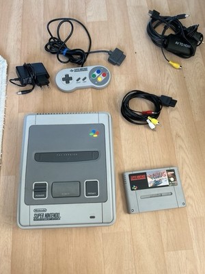 Super Nintendo SNES Konsole mit Controller und Spielen