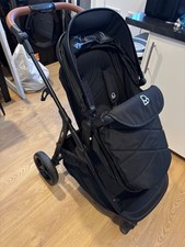 Puggle Monaco XT 2-in-1 Pushchair including raincover, puggle bag and a parasol.