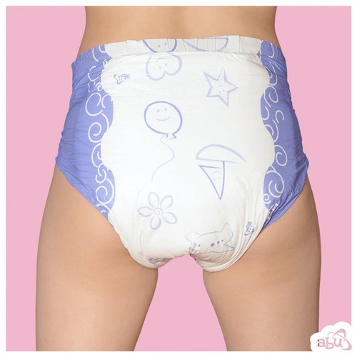 White ABU Cushies plastic backed diaper with blue and purple floral and star print, worn on a pink background.