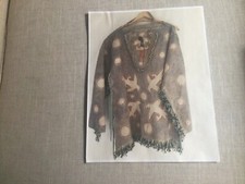 Lakota Rawhide Ghost Dance Shirt.