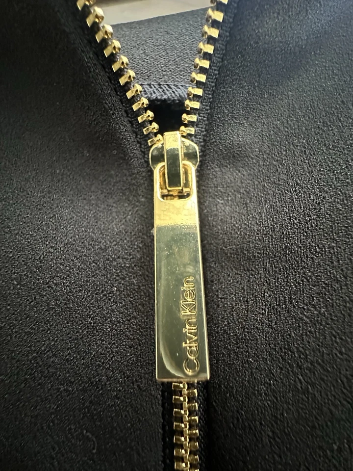 Ladies Size 6 Calvin Klein Black Dress With Exaggerated Cuff And Gold Back Zip - Image 2 of 4