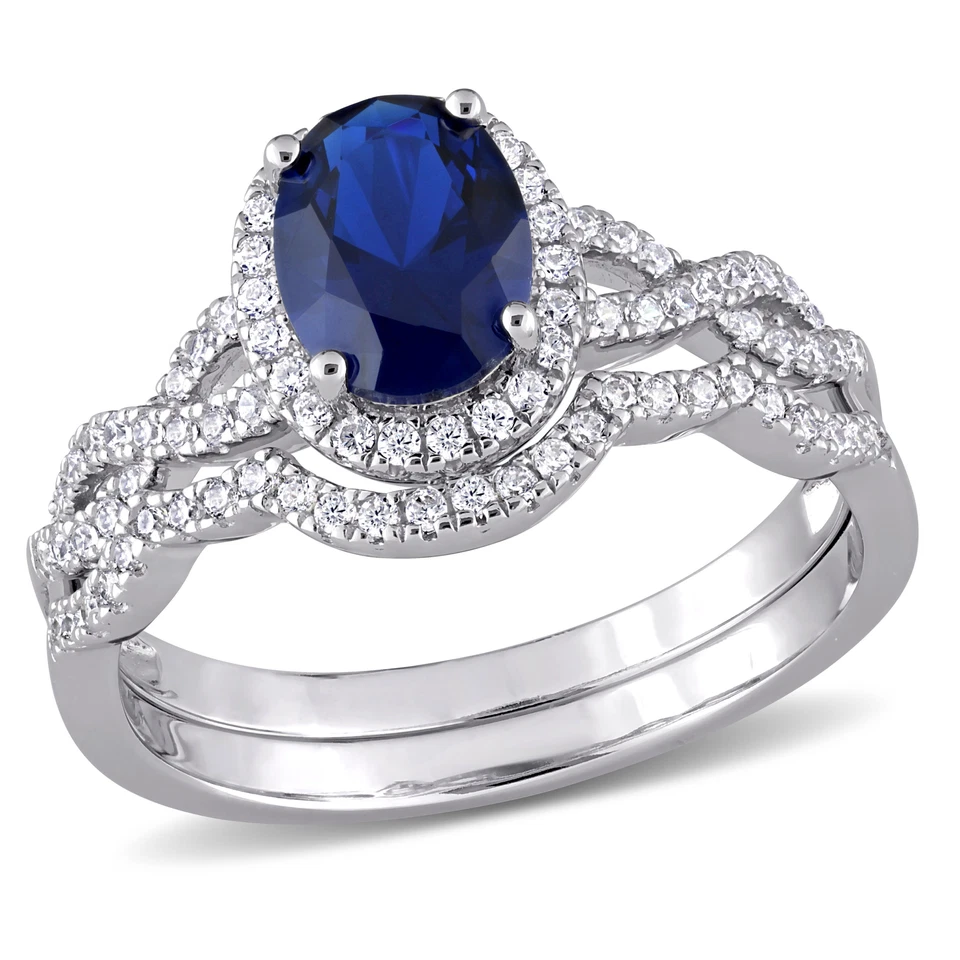 Juego de anillos entrelazados de doble halo de circonita cúbica azul y blanca de plata de ley Amour