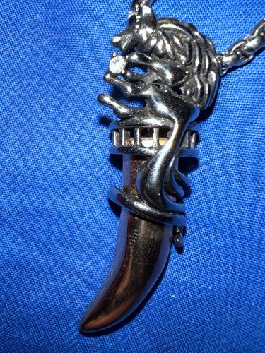 Wolf tooth with crystal, with chain. Stainless steel