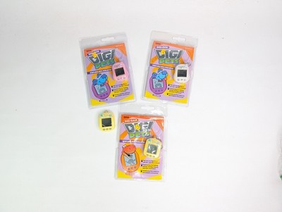 Vintage Ashten Digi Pets Lot Of 4 - Dog Dinosaur Electronic Pet Toy Keychain