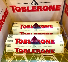 Toblerone Swiss Milk Chocolate With Honey & Almond Nougat 12 Bars x 100g