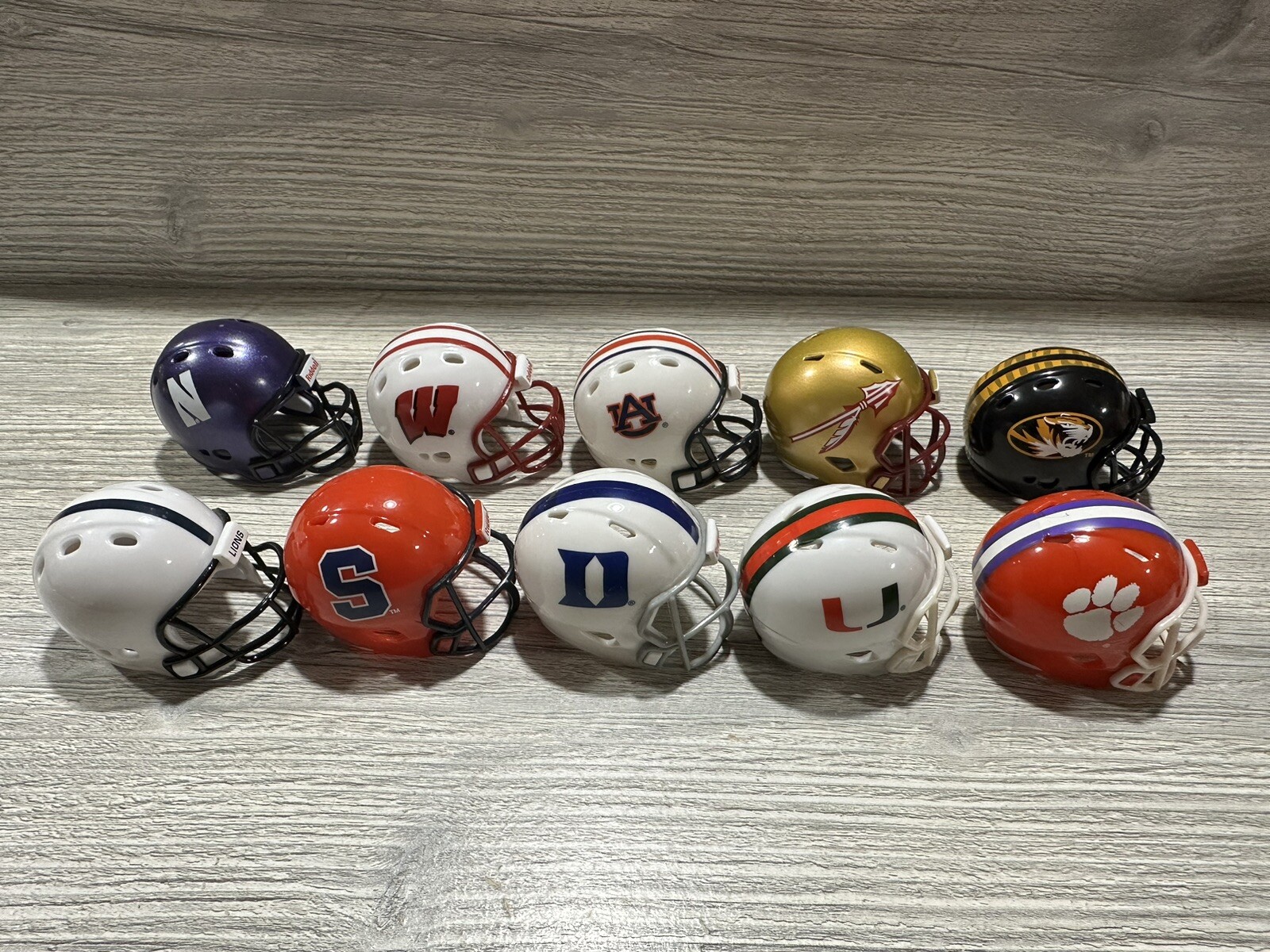 RIDDELL NCAA COLLEGE FOOTBALL MINI HELMETS 2” Lot Of 10 *See Details