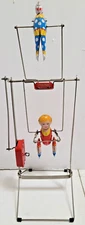 SCHYLLING TIN WIND UP TIK TAK ACROBOAT TOY