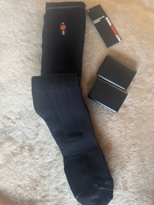 Ororo heated socks with charging port and 2 batteries. Never been worn, tags on