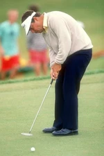 American golfer Tim Norris putts during the day two Kemper Open at- Old Photo