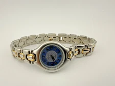 Claremont New Battery Women's Silver/Gold Tone 7 1/4" Bracelet Band Analog Watch