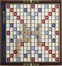 Scrabble Deluxe Travel Edition - Fun for 2 to 4 Players on the Go!
