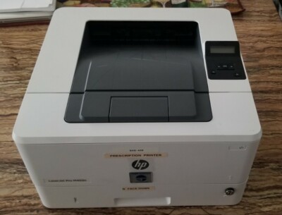 HP LASER JET PRINTER PRO M402N - WORKS  TRAY WITH THE LOCK , KEY NOT INCLUDED 