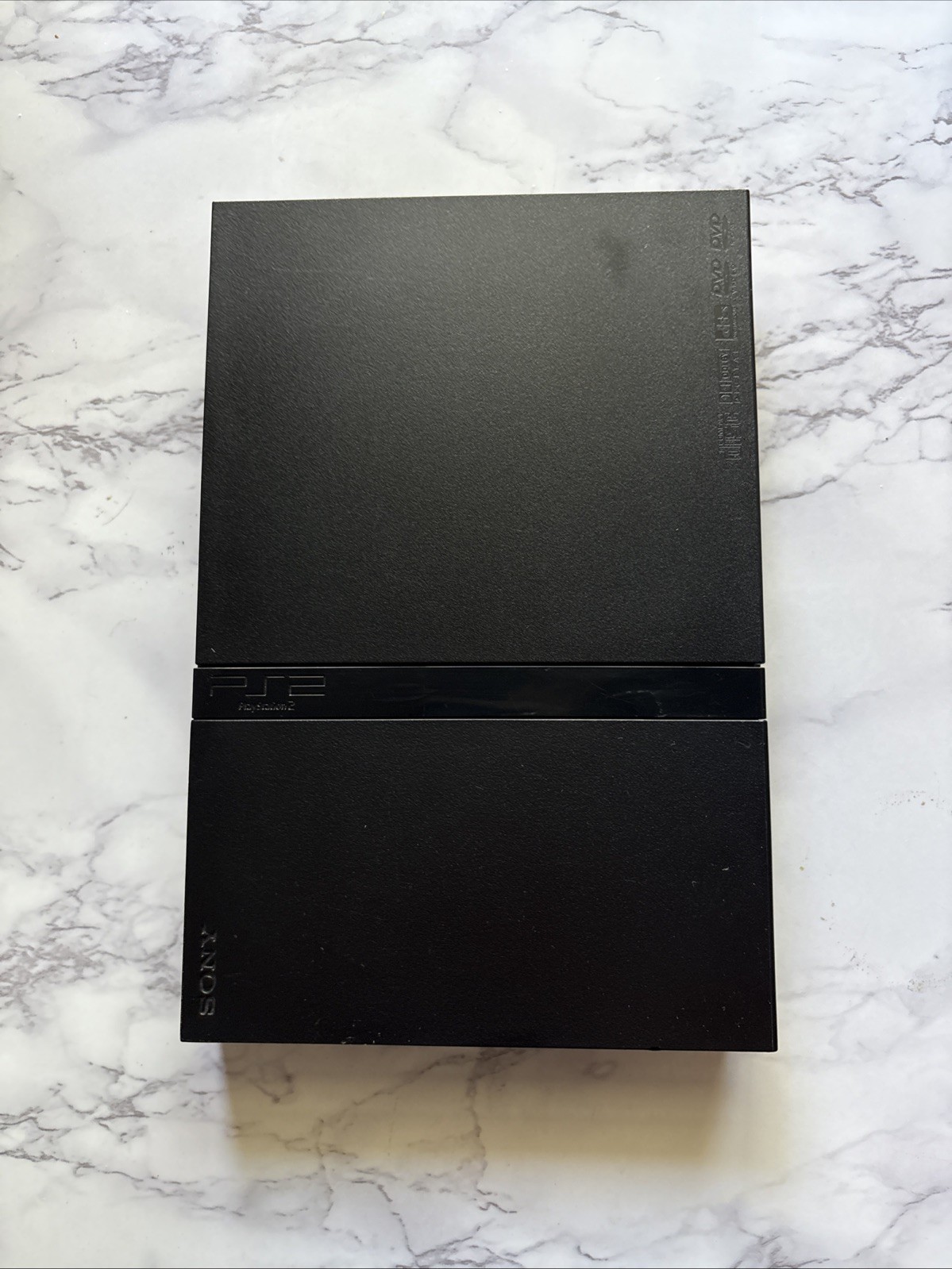 PlayStation 2 Slim Console Condition Details in Listing  