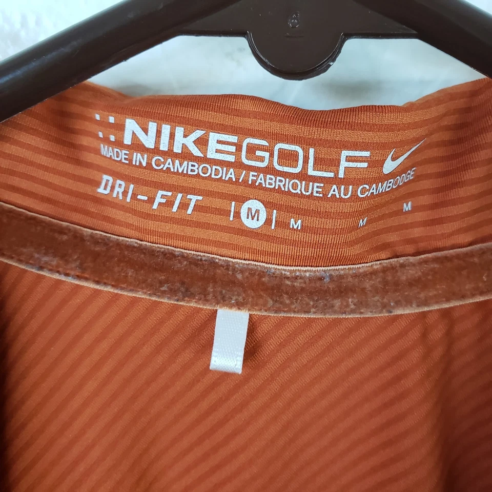 Camisa polo de golf Nike DRI-FIT para mujer mediana naranja quemado a rayas 1/4 botón a presión Foto 2 de 4