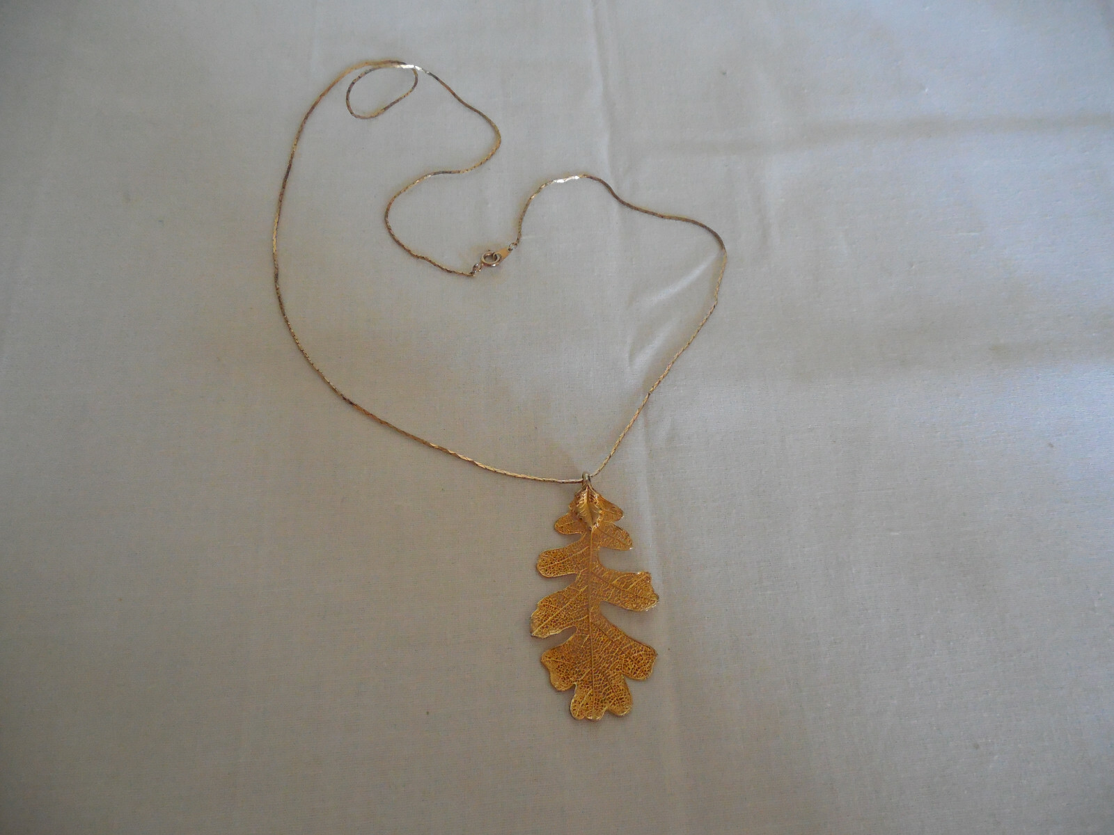 Leaf dipped in gold pendant  necklace - image 1