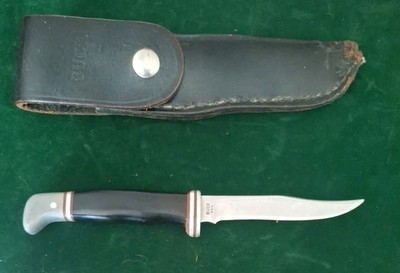 VTG BUCK KNIFE  WITH SHEATH, SHEATH IS MARKED 106 BELIEVE THE KNIFE IS A 102?