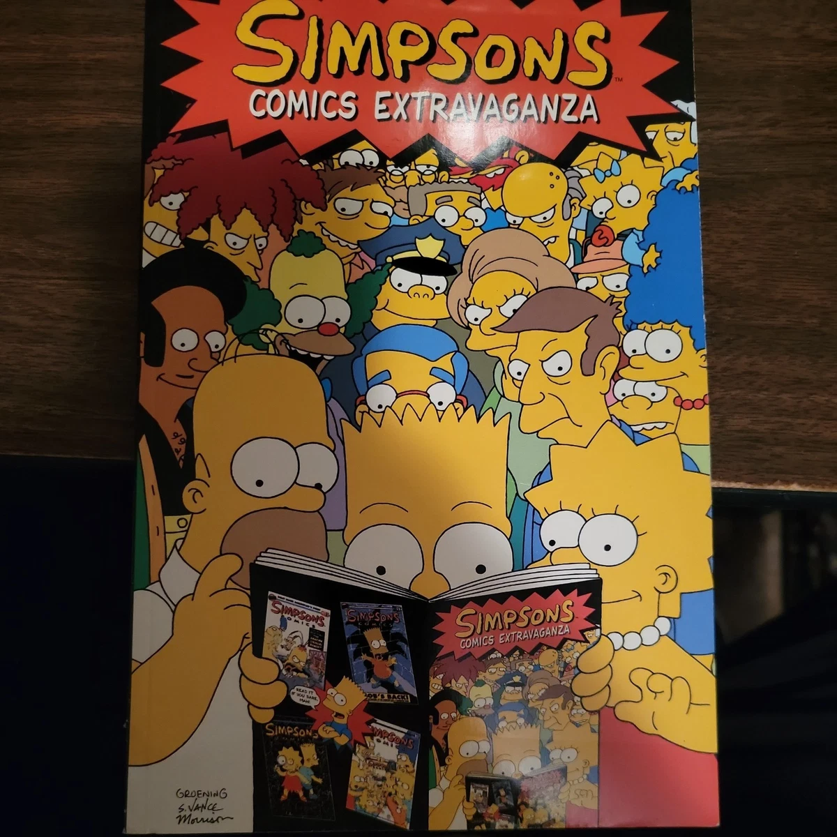 Preços baixos em Os Simpsons Graphic Novel Capa mole Comics