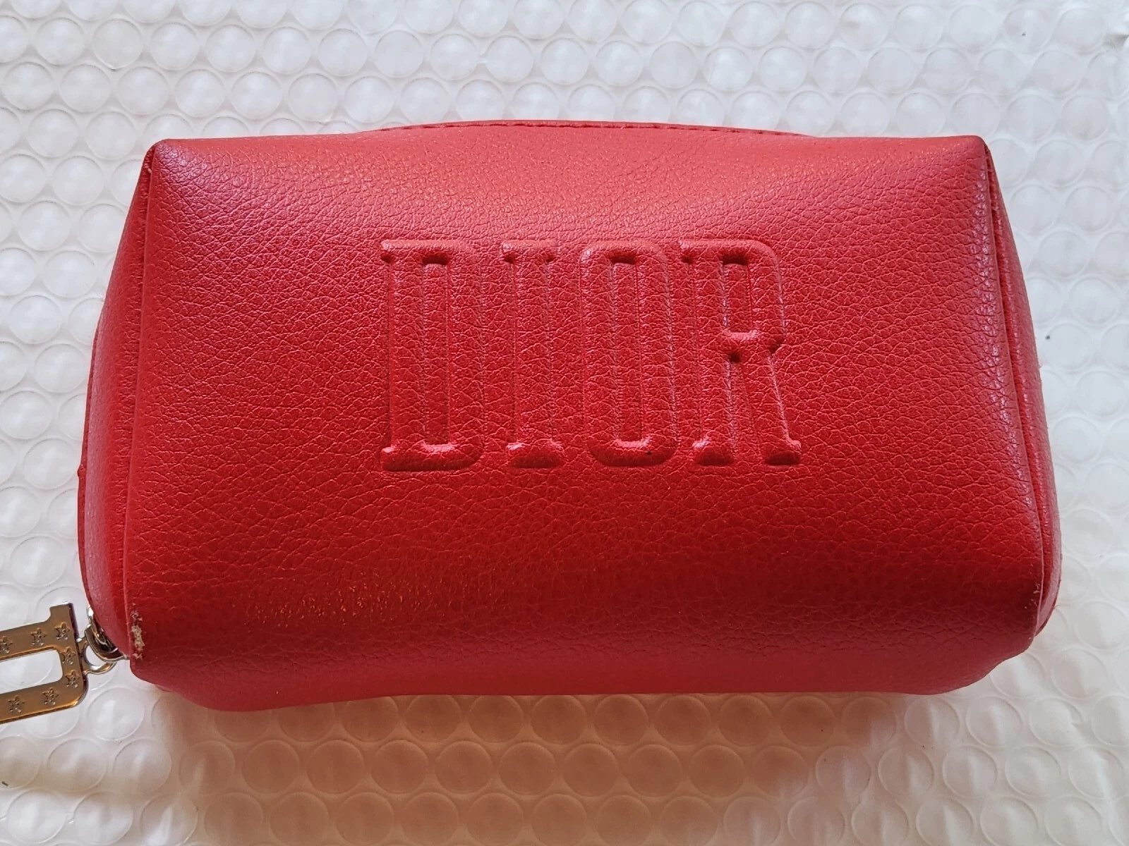 Pochette d'occasion logos Christian Dior rouge 100 % polyuréthane nouveauté petite