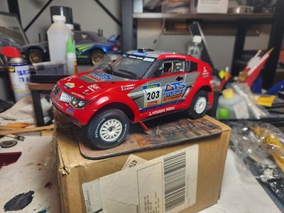 1/18 MITSUBISHI PAJERO EVO. DAKAR S. PETERHANSEL SOLIDO (NO BOX)
